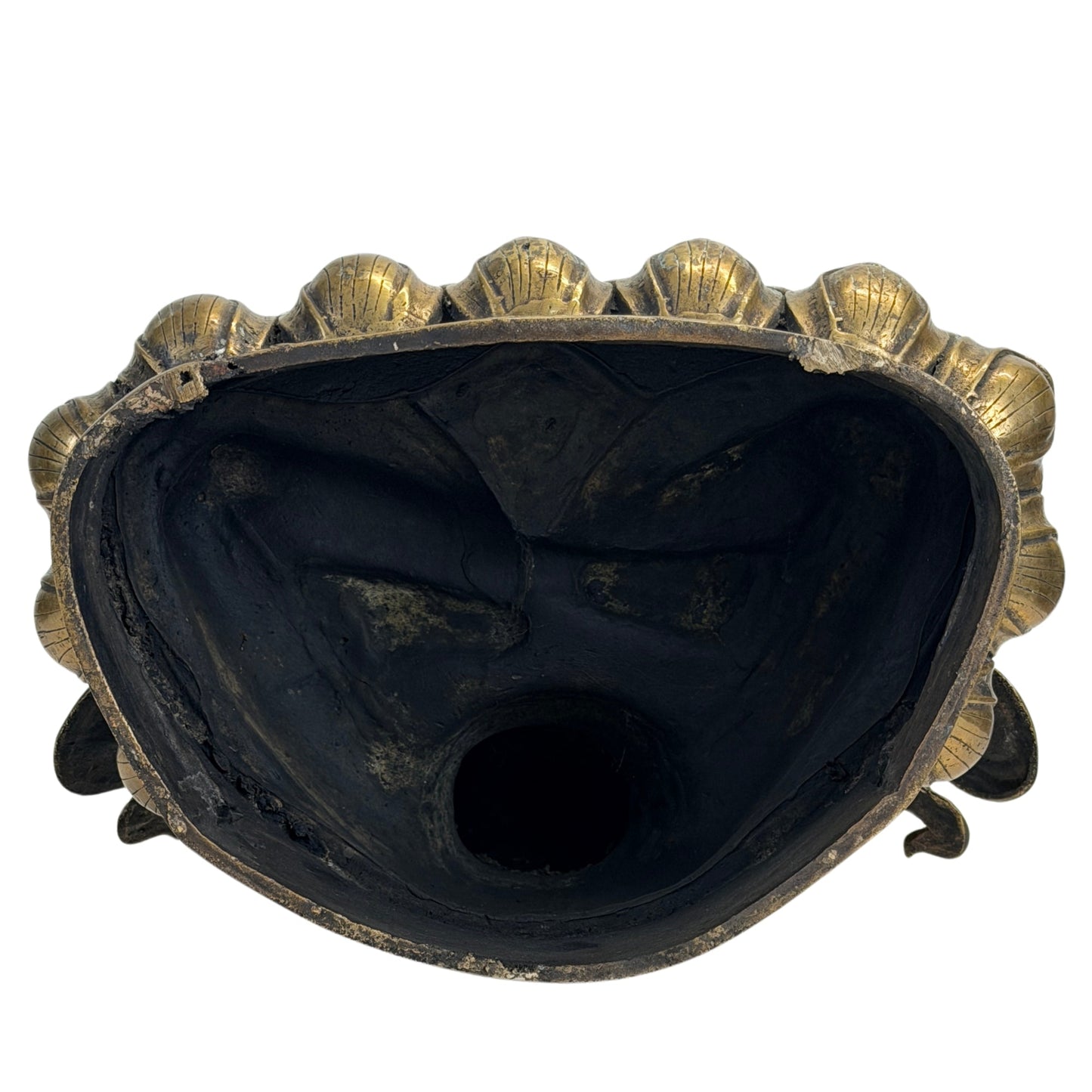 Underside of the antique Vajrasattva lotus base showing historic construction and wear