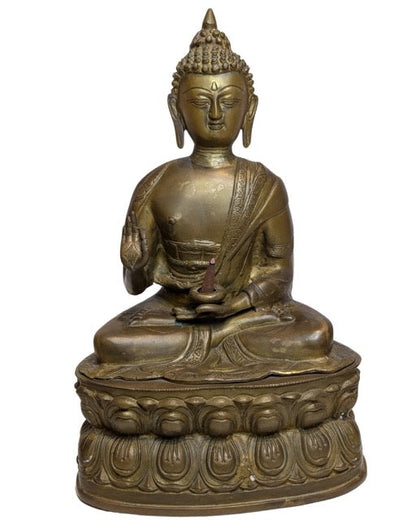 17th–18th Century Tibetan Fire-Gilt Bronze Buddha – three-quarter front view