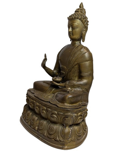 17th–18th Century Tibetan Fire-Gilt Bronze Buddha – right-side view