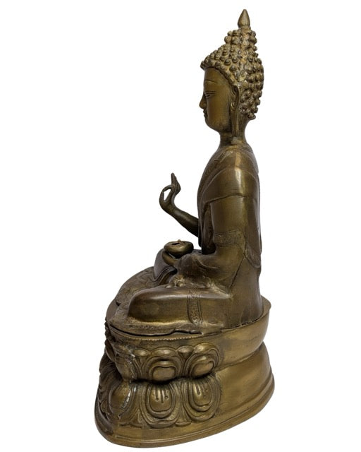 17th–18th Century Tibetan Fire-Gilt Bronze Buddha – opposite three-quarter front view