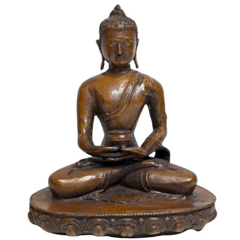 Inlaid eyes and serene face of the 17th-century Himalayan Buddha