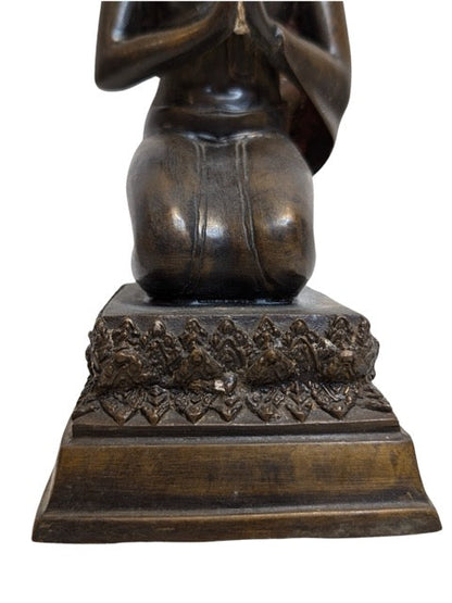 Kneeling bronze Buddha from the Myanmar or Thai tradition