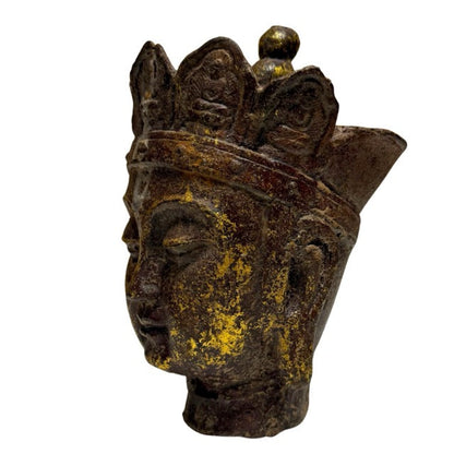 Profile and aged surface of the larger iron head