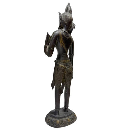 Rear three-quarter view of Himalayan standing Tara on a lotus pedestal