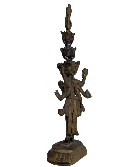 Detailed traditional bronze casting on the Avalokiteshvara figure