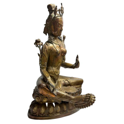 Front angle of Tibetan Green Tara in relaxed royal posture