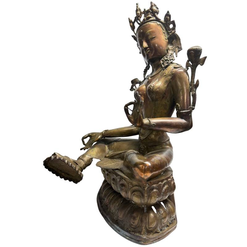 Opposite front angle showing Tara's Varada gesture and lotus throne