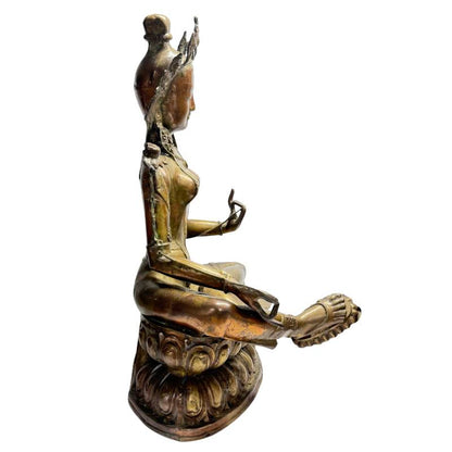 Side view of Green Tara showing extended right leg and lotus throne