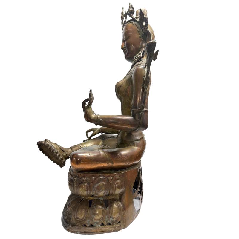 Opposite side view of Green Tara with raised left hand and extended foot