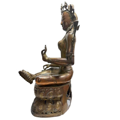 Opposite side view of Green Tara with raised left hand and extended foot