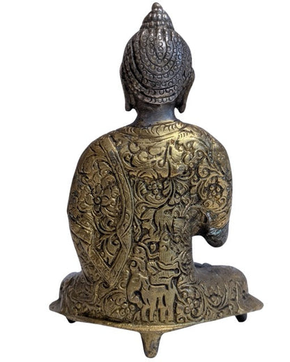 Finely engraved robe on the seated bronze Buddha