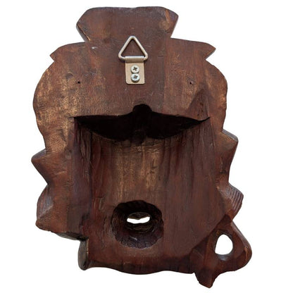 Carved details of the Chinese wooden Guanyin mask head