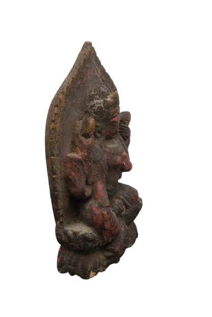 Closed plain reverse of the small Himalayan devotional figure