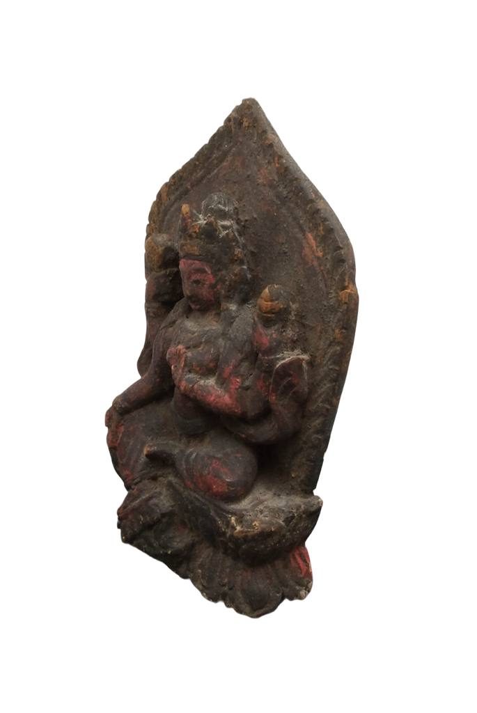 Original red pigment traces and natural age patina on the wooden Tara