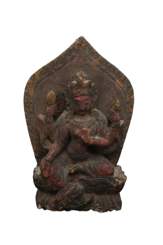 19th-century Himalayan wooden Tara seated within a leaf-shaped aureole