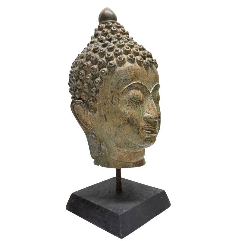 Front angle of Southeast Asian bronze Buddha head with spiral curls and ushnisha