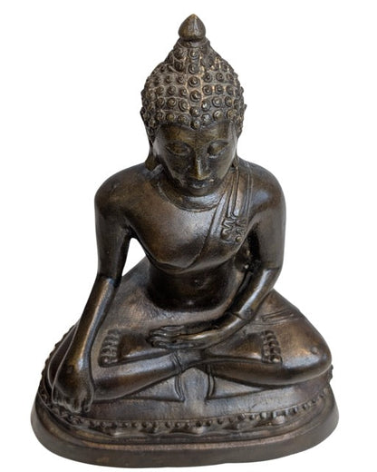 Old clay traces and oxidation visible at the Buddha base