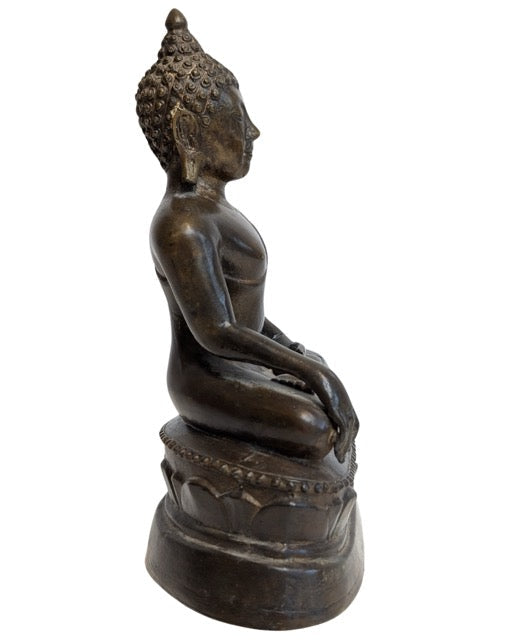 Thai bronze Buddha making the earth-touching gesture