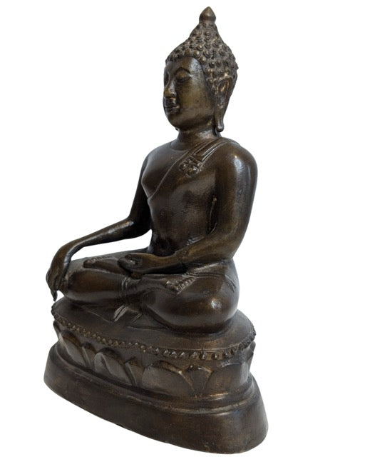 Detailed lotus pedestal beneath the Thai Buddha