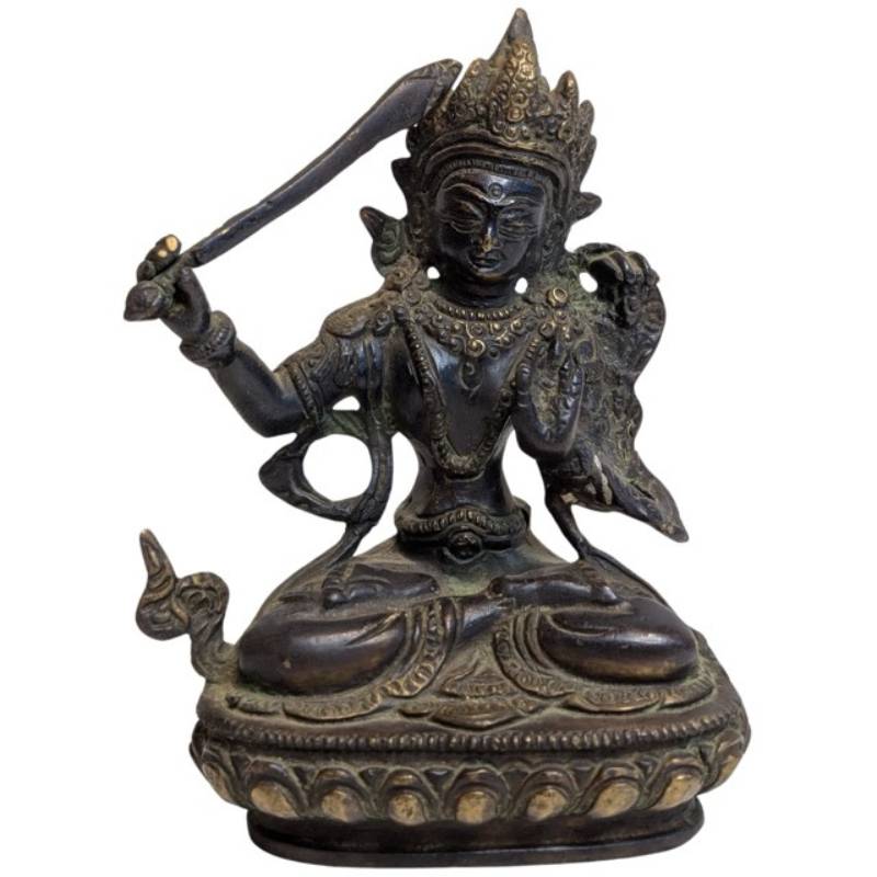 Natural patina on the 19th-century Tibetan bronze Manjushri