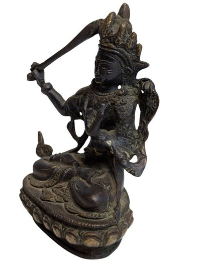 Elaborately adorned crown on the Tibetan Manjushri