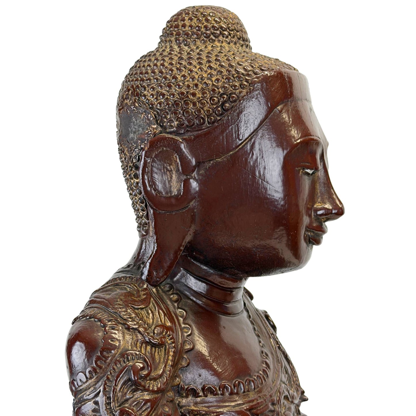 Linkerprofiel van het gezicht van een antiek Mandalay Boeddhabeeld met originele bladvergulding