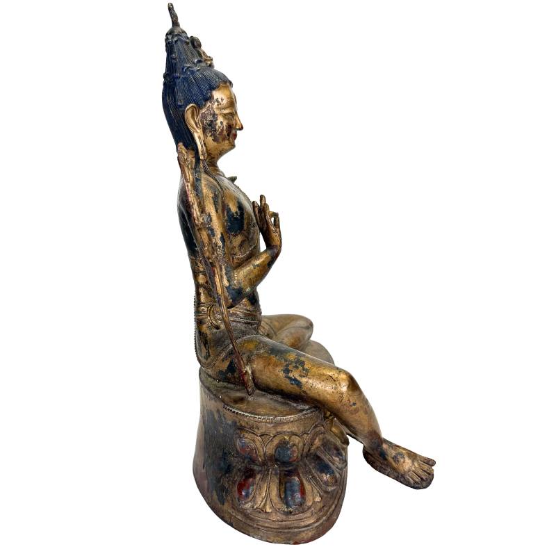 Natuurlijke patina en warme vergulding op een Tibetaanse Bodhisattva
