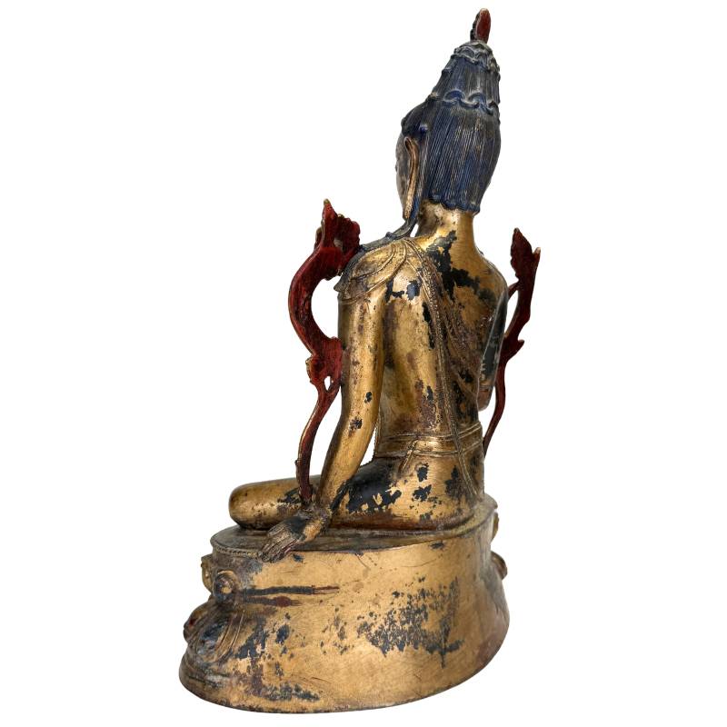 Natuurlijke patina en warme vergulding op een Tibetaanse Bodhisattva