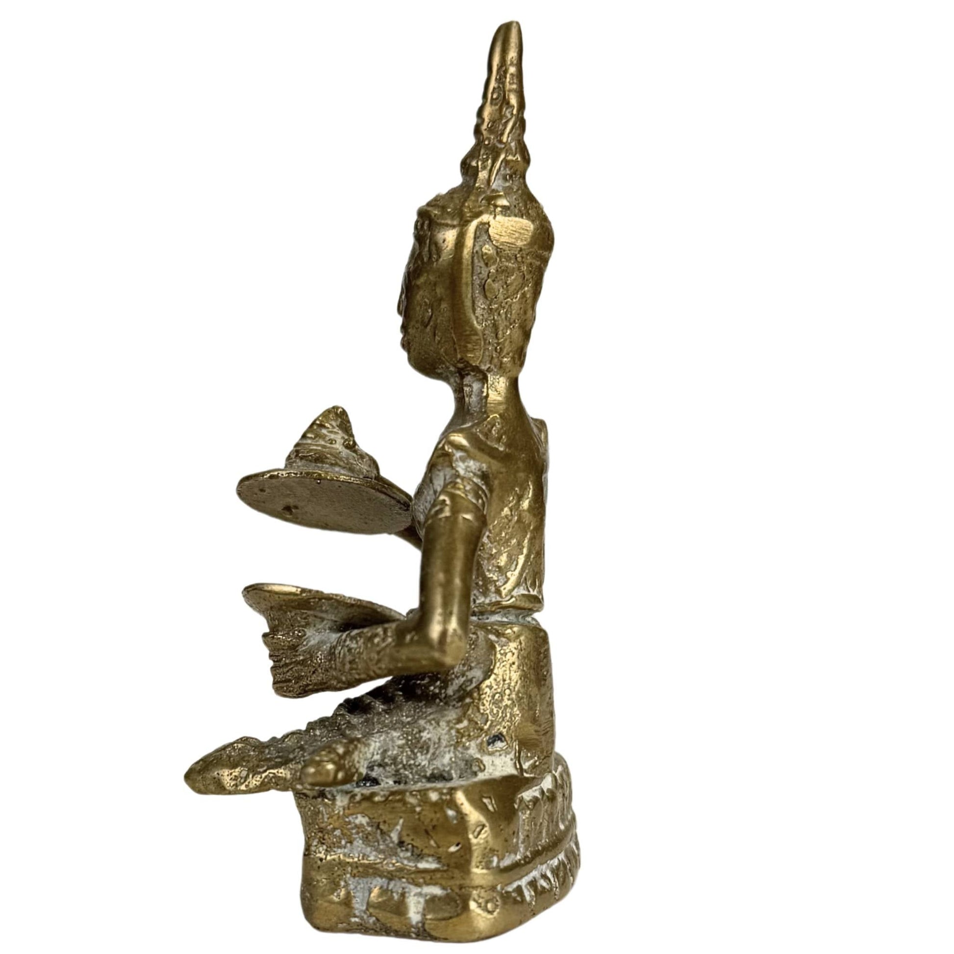 Achterzijde van oud Thais bronzen beeldje met gebruikssporen