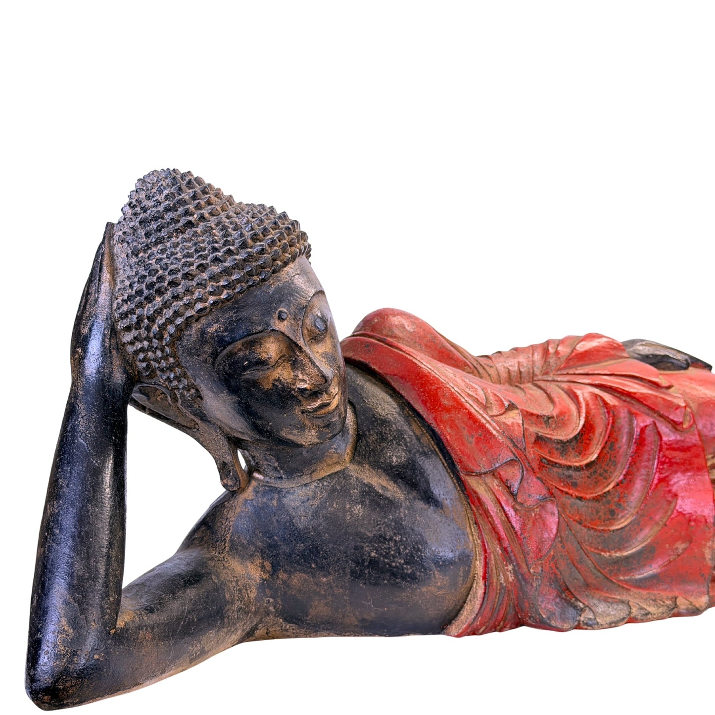 Rear view of the antique Burmese reclining Buddha in carved teak