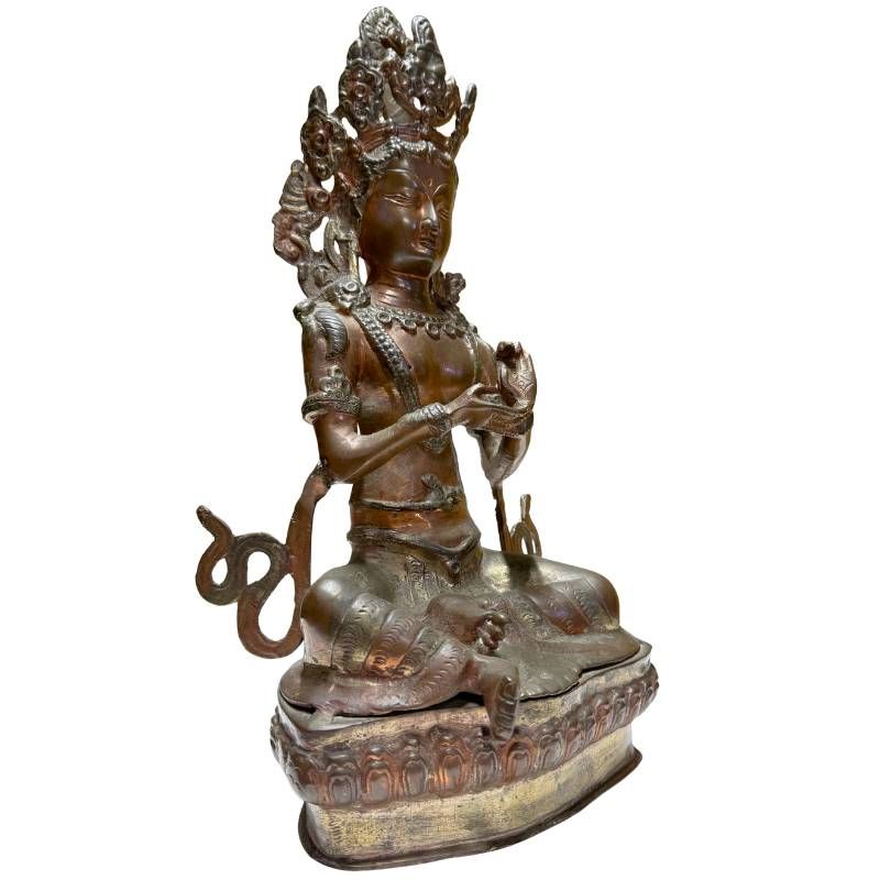 Antique Himalayan bronze Tara, front-left view with extended leg