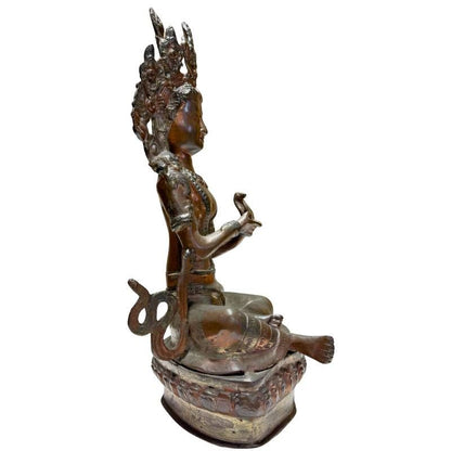 Antique Himalayan bronze Tara, left profile showing crown and lotus stem