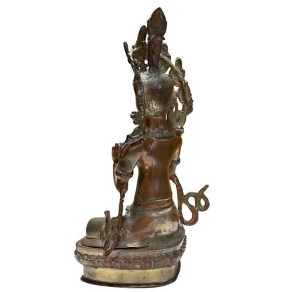 Antique Himalayan bronze Tara, rear-right view with dark historic patina
