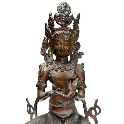 Antique Himalayan bronze Tara, detail of face, crown and Kataka Mudra