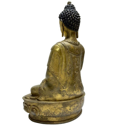Opposite rear angle of Himalayan gilt bronze Medicine Buddha