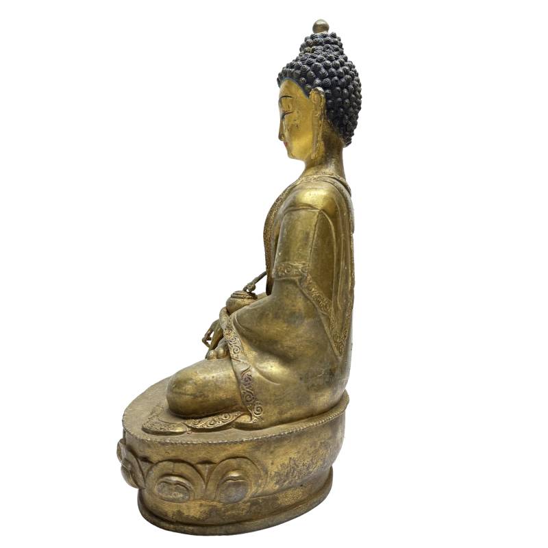 Opposite side view of Himalayan gilt bronze Medicine Buddha