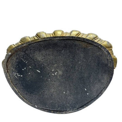 Closed underside plate of the Medicine Buddha lotus base