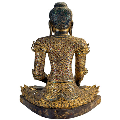 Historic gilding and aged surface detail on the antique Mandalay Buddha