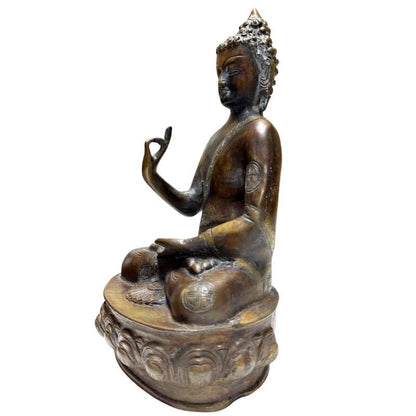 Antique Nepalese bronze Buddha in Vitarka Mudra, front-right view