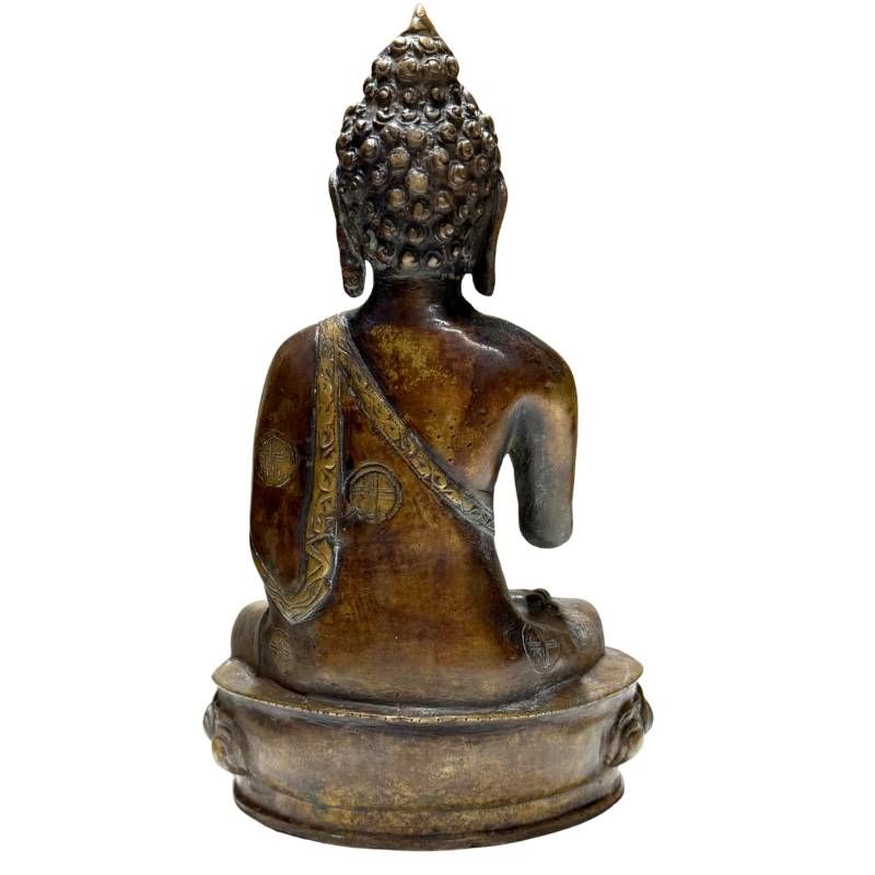 Antique Nepalese bronze Buddha, rear view with dark patina and lotus base