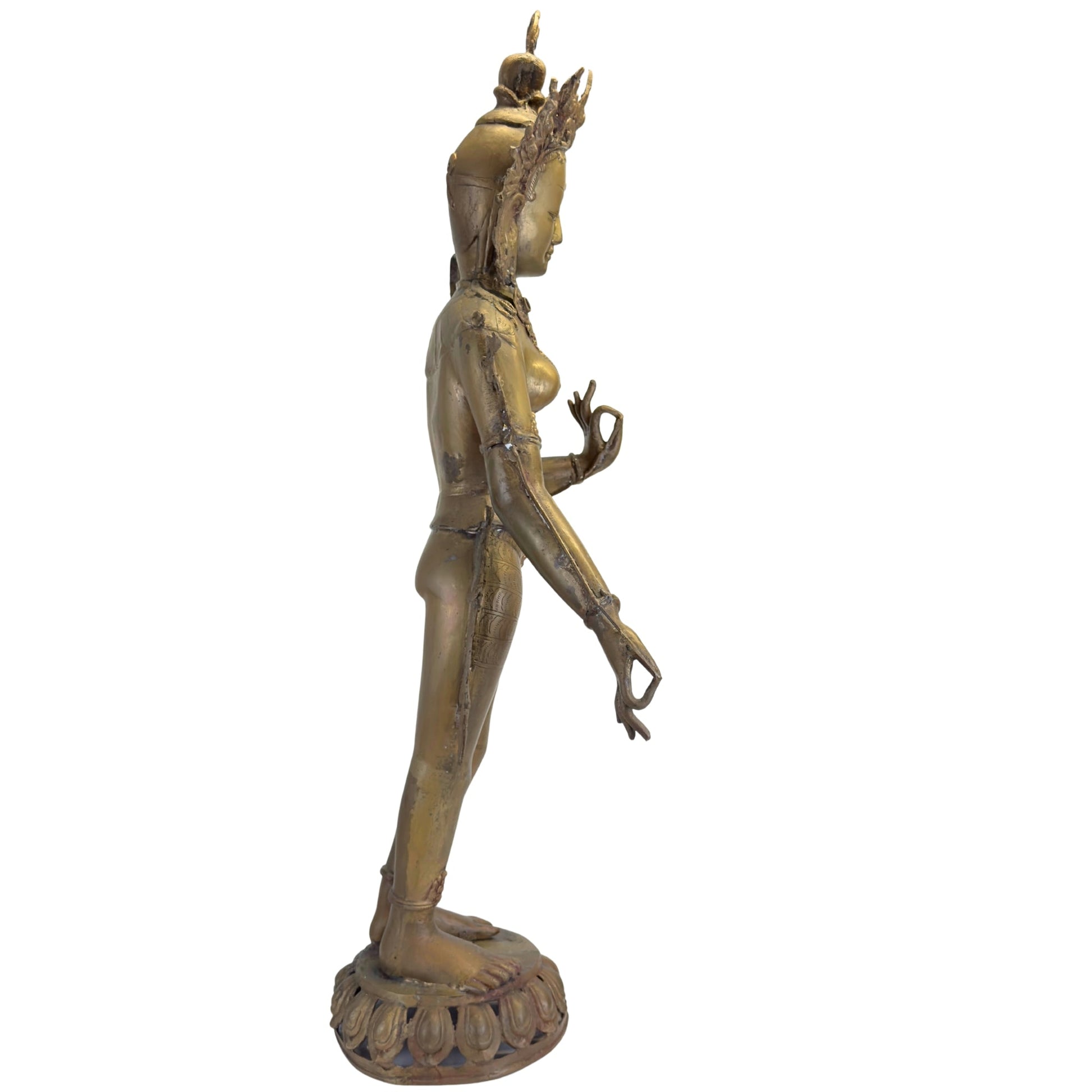 Right profile of the antique Nepalese Green Tara with naturally aged surface