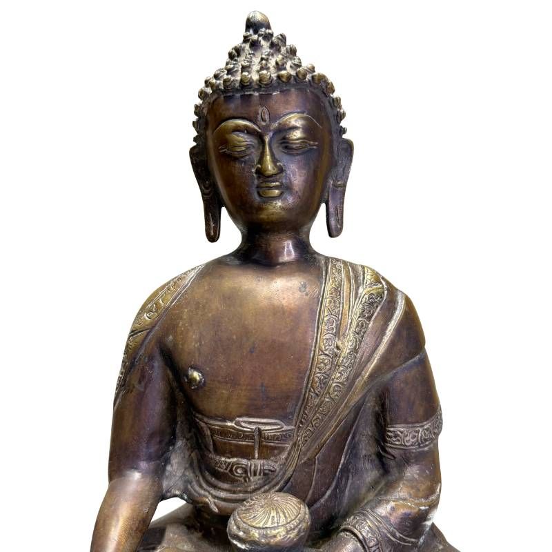 Antique Sino-Tibetan Medicine Buddha, detail of face, robe and medicine vessel