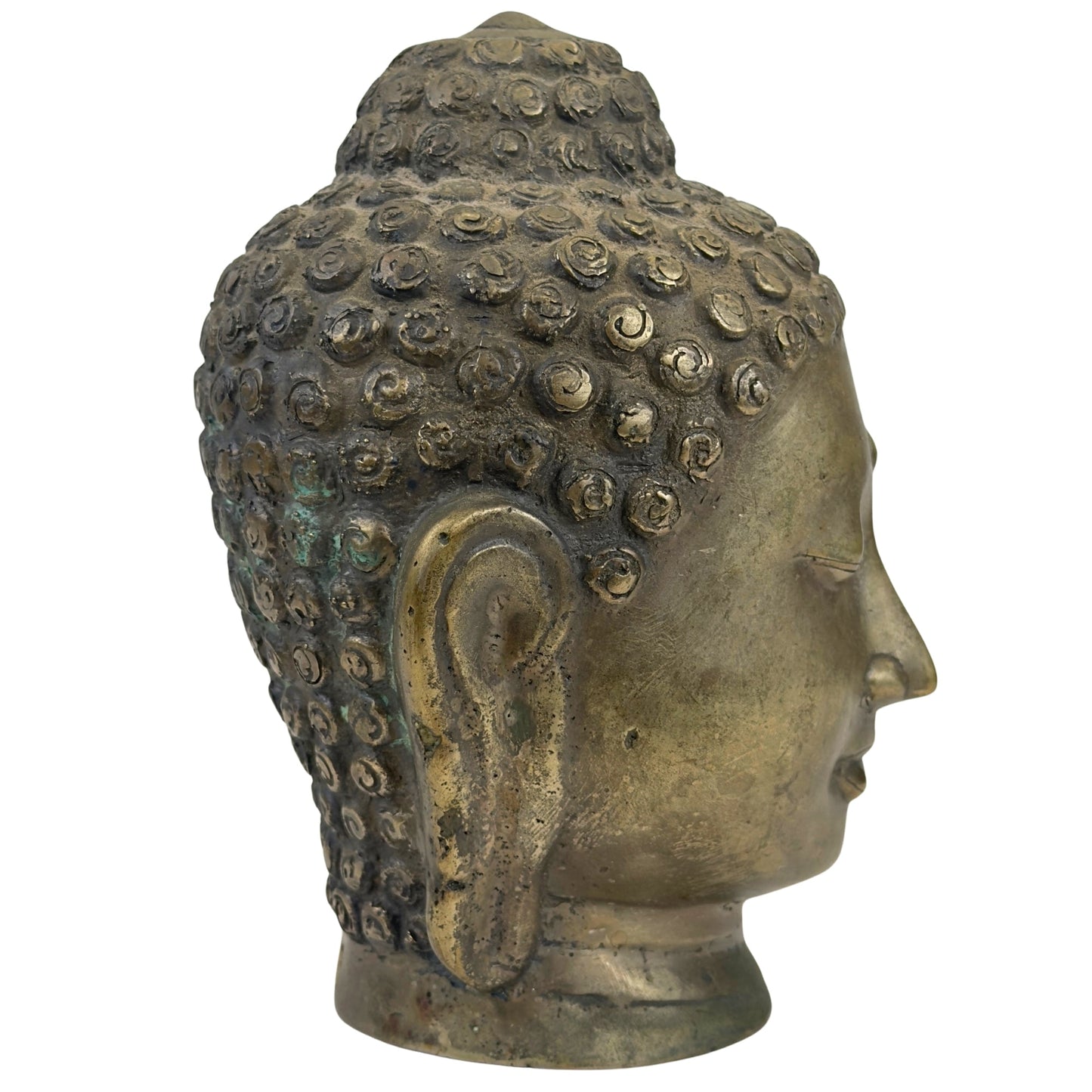 Left profile of the antique Thai Buddha head with aged bronze patina
