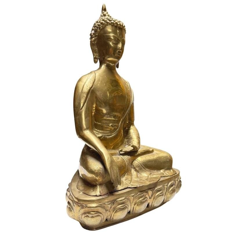 Antique Tibetan gilt bronze Buddha, front-left view on lotus base