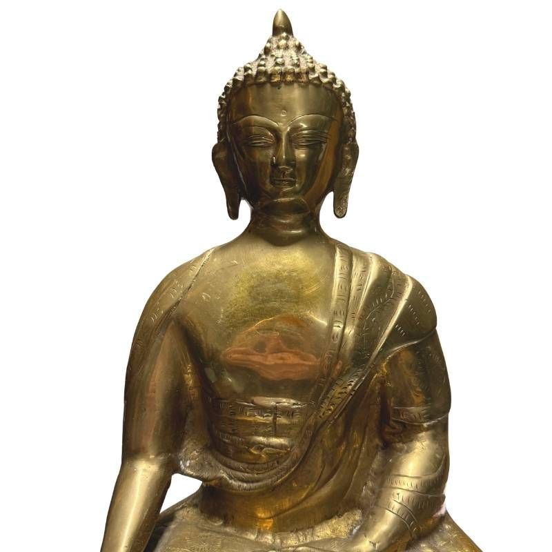 Antique Tibetan gilt bronze Buddha, detail of face, ushnisha and robe