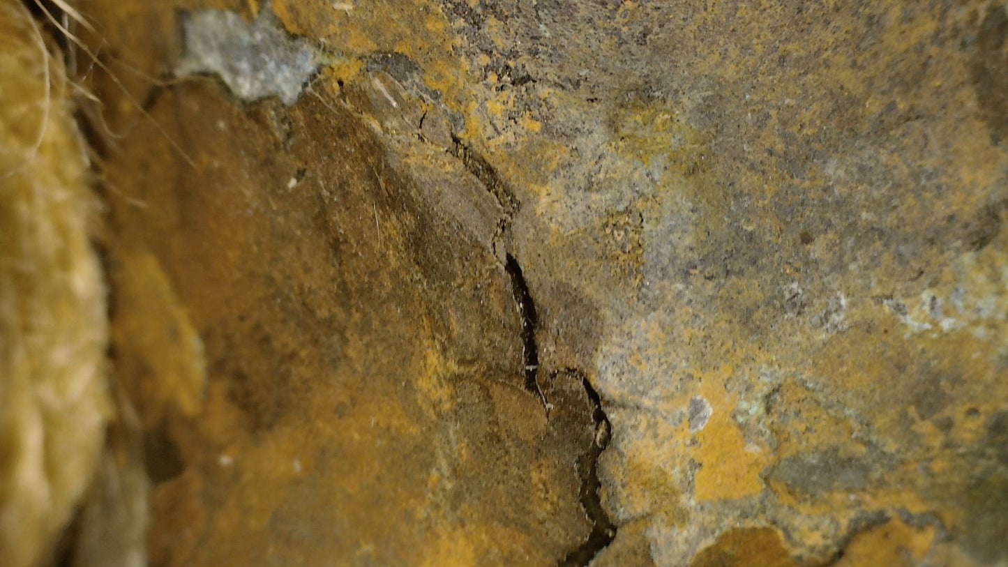 Macro detail of natural patination and historic surface layers on the Ayutthaya Buddha, view 08