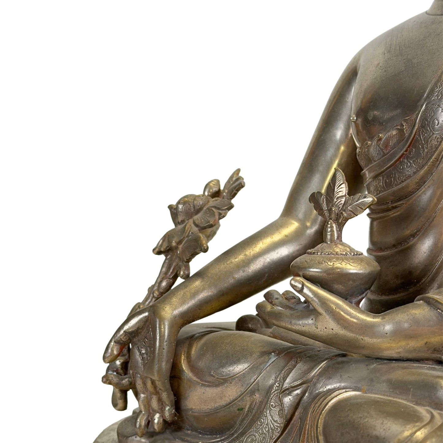 Medicine bowl, myrobalan plant and engraved robe detail on the silvered Bhaisajyaguru