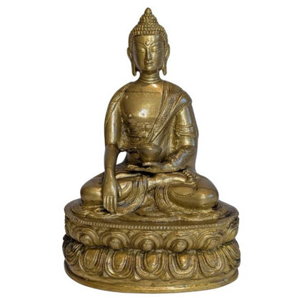 Surface detail of the brass Medicine Buddha figure