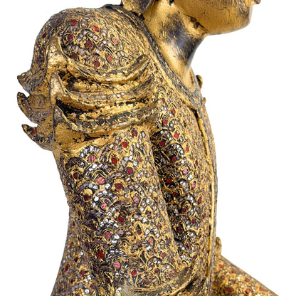 Traditional thit-si lacquer surface on the antique Burmese Buddha
