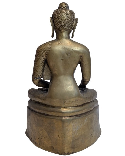 Detailed bronze robes on the seated Shakyamuni